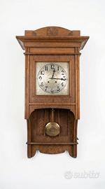 Orologio a pendolo da parete in legno massello