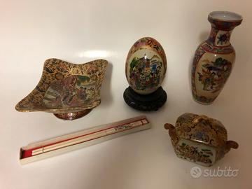 Uovo e svuotatasche arte cinese in ceramica