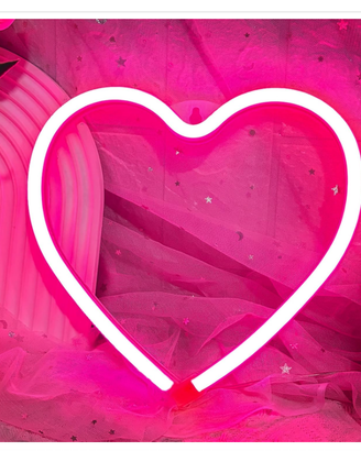 Insegna al neon a forma di cuore colore rosa luce