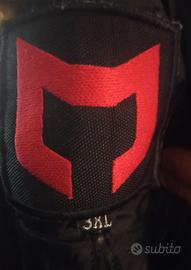 giubbotto e pantalone in tessuto da moto