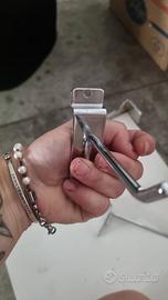 Ganci per stigliatura dogata in metallo