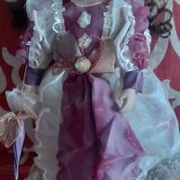 Bambola in porcellana da collezione