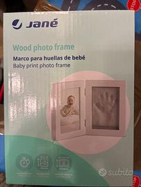 Cornice e impronta bambino