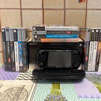 PSP Slim & Lite nera + 11 giochi e 4 UMD