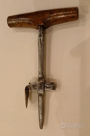 Antico taglierino per rondelle in pelle cuoio