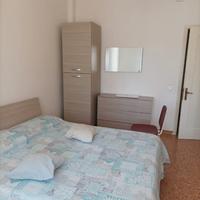 Camera singola ampia e ben arredata