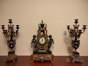 Orologio e due candelabri