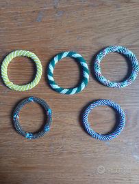 6 collane e 9 bracciali rigidi sudafricani