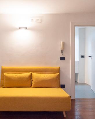 Nio - Divano letto pieghevole 2 posti giallo senap