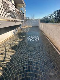 Posatore pavimenti esterni