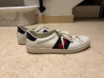 Sneakers Gucci Ace in pelle bianca con nastro Web