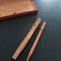Penna stilografica + portamine laminate oro 18k