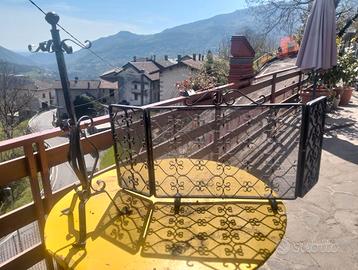 Porta attrezzi e parascintille