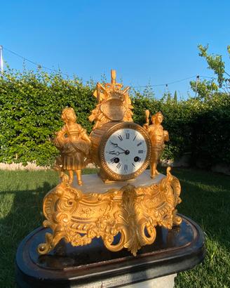 Orologio antico da camino