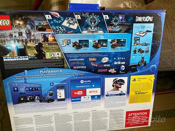 ps4 con giochi e due controller