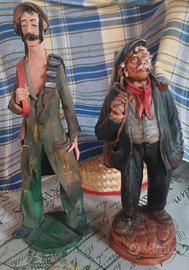 coppia di statuette raffiguranti pastori sardi 