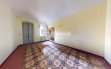 Trilocale con giardino in centro