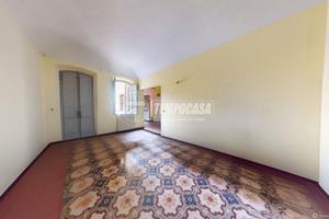 Trilocale con giardino in centro