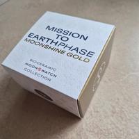 Omega swatch mission to earthphase moonshine gold 