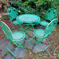 Tavolo e sedie da giardino in ferro battuto