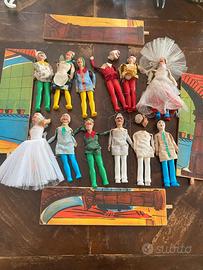 12 MARIONETTE anni '60 in gesso e plastica