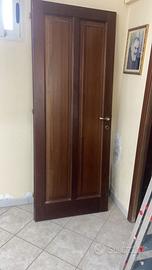 Porta un legno