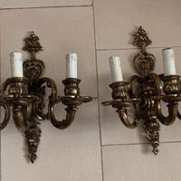 Applique dorate a tre luci in ottone