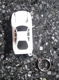 Portachiavi a forma di auto con torcia