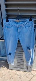 Jeans skinny elasticizzati vita bassa con decori