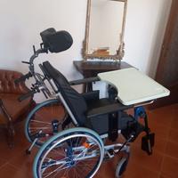 Sedia a rotelle basculante