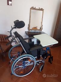 Sedia a rotelle basculante