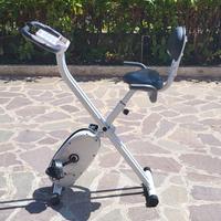 Cyclette SportPlus pieghevole con schienale