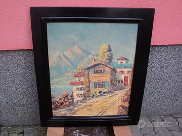 Quadro casa con monti cornice nera massello