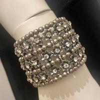 Bracciale rigido argentato con zirconi