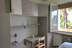 Singola in ampio appartamento via Udine