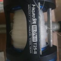Canna da traina con mulinello.