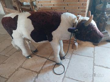 mucca peluche realistico