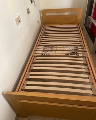 Letto singolo con rete e materasso e comodino con