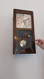 orologio a pendolo da muro
