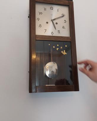 orologio a pendolo da muro