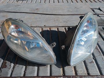 coppia fari lancia Ypsilon o musa 