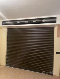 Saracinesca avvolgibile garage con motore
