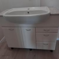 lavabo con piano in marmo rosa e mobiletto 