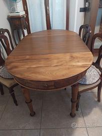 Tavolo antico ovale allungabile in legno massello