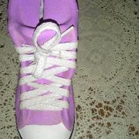 Salvadanaio a forma di scarpa