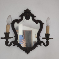Coppia di specchi con lampadine a candelabro