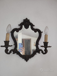 Coppia di specchi con lampadine a candelabro