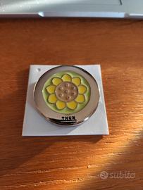 Gancio portaborse Country con Girasole
Thun
