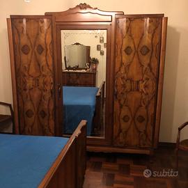 Camera in radica di Noce