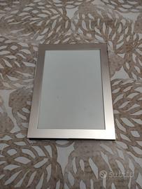 Cornice in silver, per foto 17 x 11,5 cm.